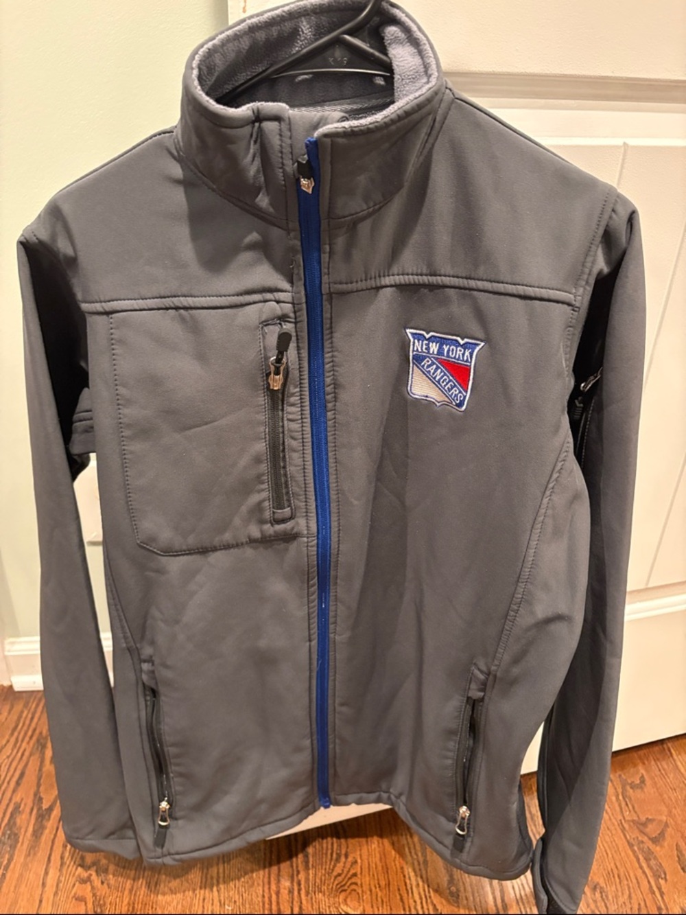 NHL Gray Jacket with Blue Zipper Accent